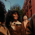 friends walking in the city; fair housing month